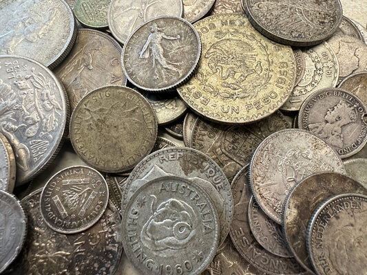 Rare collectable silver coins stacked on top of each other